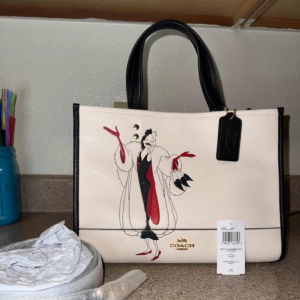 NWT Coach Dempsey Tote with Cruella DeVil